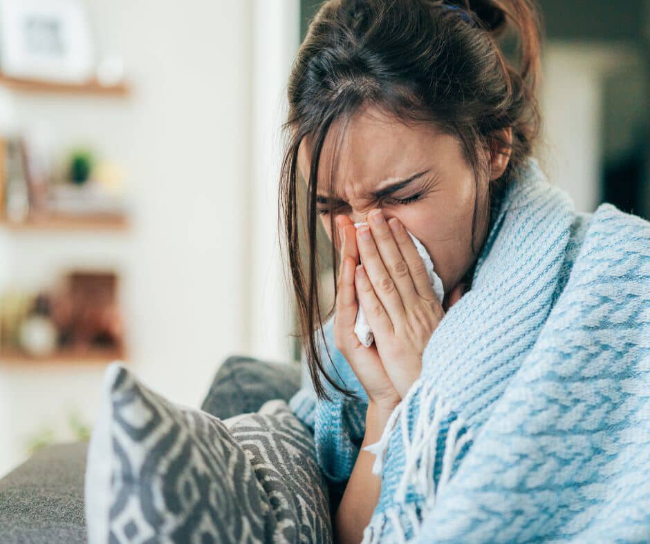 Woman Sneezing